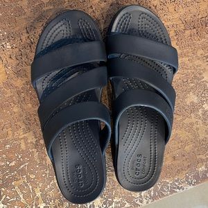 Women Crocs heeled sandals.